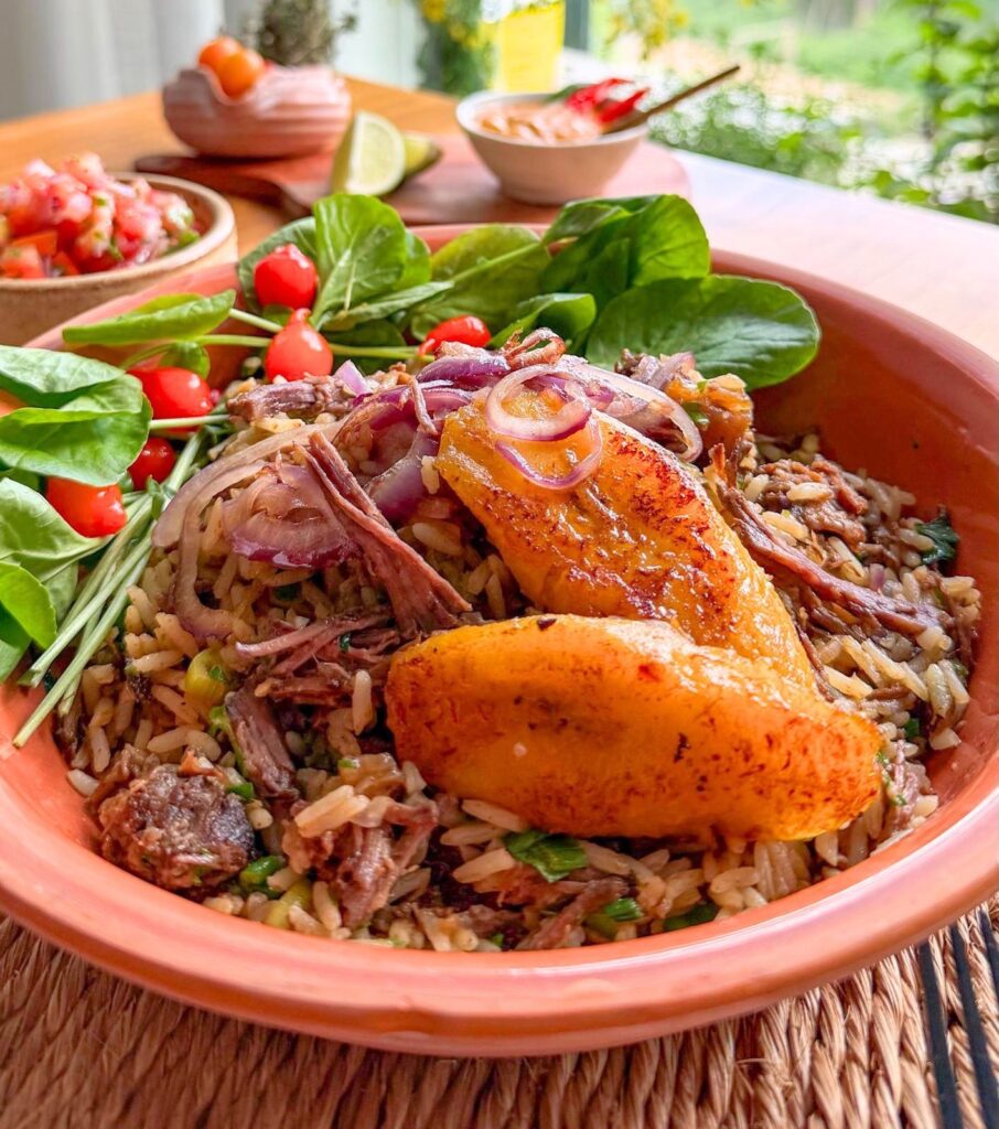 Arroz de Costela: slow-braised beef rib rice with caramelized onions and vinaigrette